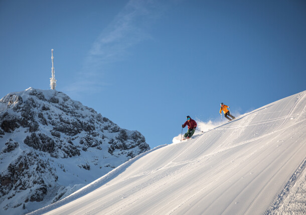     Fun on the slopes of the Harschbichl with a view of the Kitzbüheler Horn in St. Johann in Tirol 